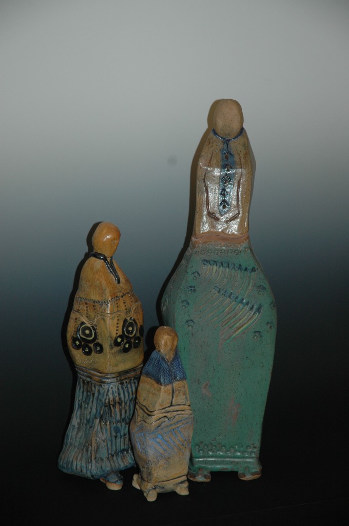 Shaman Family, slab built funerary pieces, Father is 19″ T, Mother is 14″ T, Child is 9″ T, Stoneware with matte glazes; Father $225.00, Mother $175.00, Child $155.00.  Other styles are available